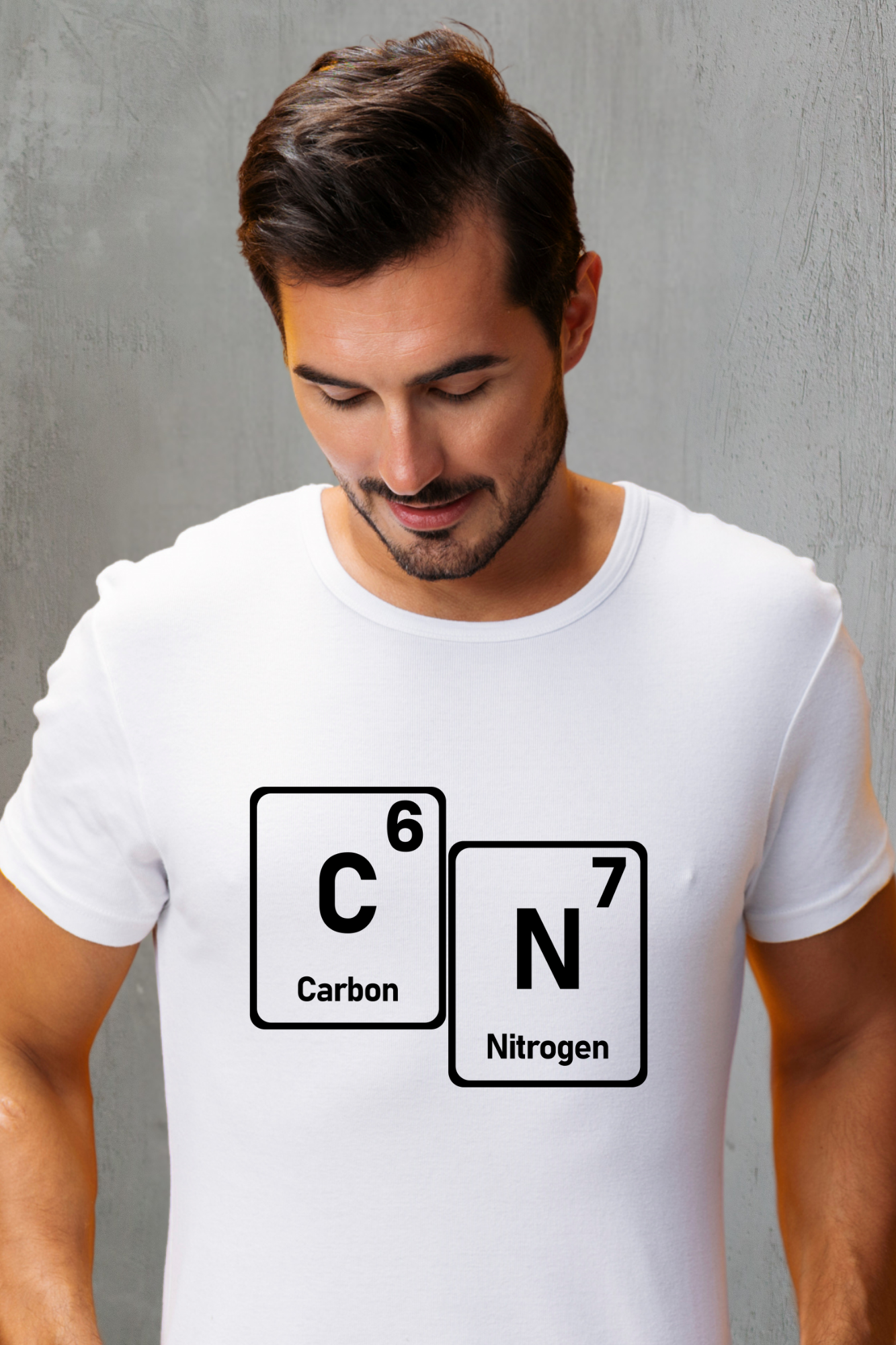 Man wearing a white t-shirt with 67 carbon and nitrogen chemical symbols.