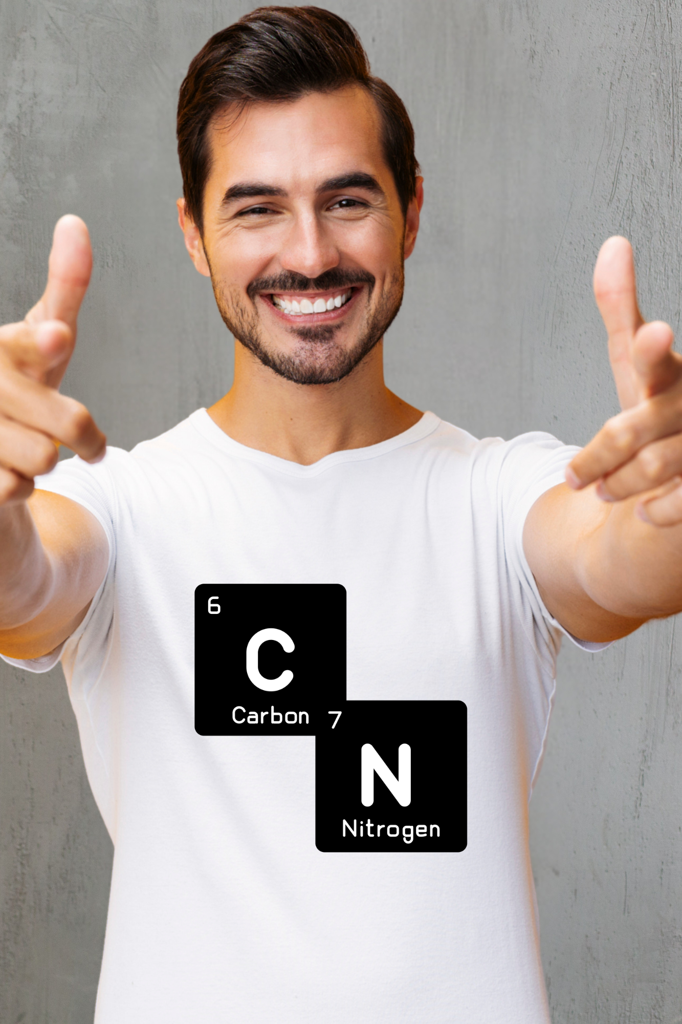 Man wearing a white t-shirt with a 67 carbon and nitrogen chemical symbol design, giving a thumbs-up gesture against a gray background.