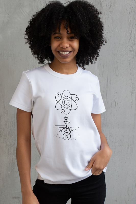 Person wearing a white t-shirt with a black 67 design against a gray background