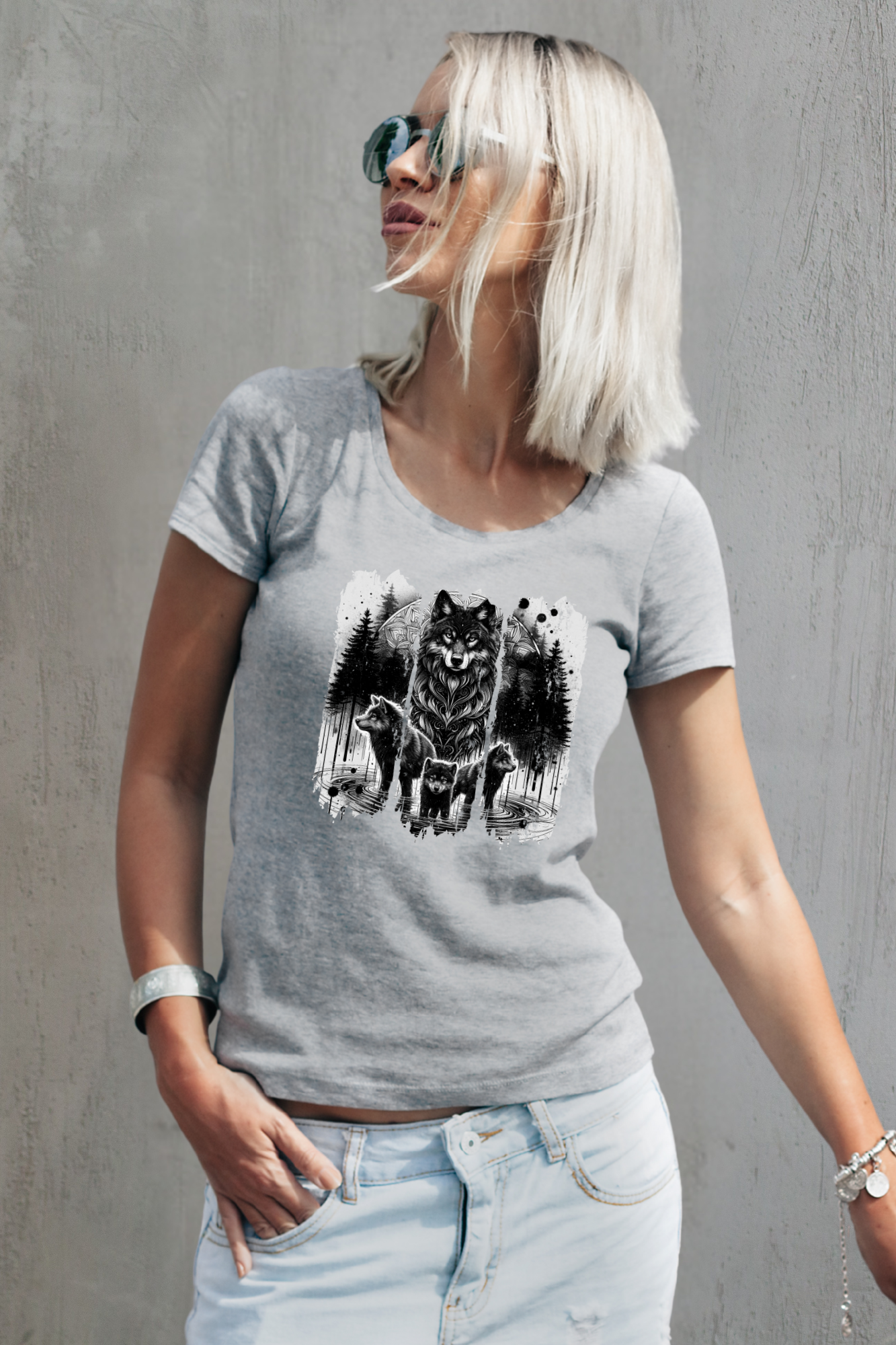 Person wearing a gray t-shirt with a wolf graphic against a gray background