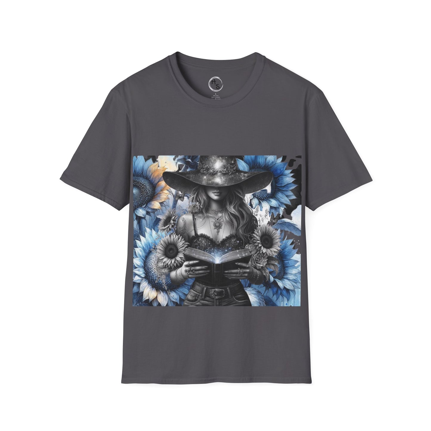 Gray t-shirt with a graphic design of a witch holding a book surrounded by flowers on a white background