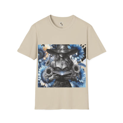 Beige t-shirt with a graphic design of a person holding a book surrounded by flowers on a white background.