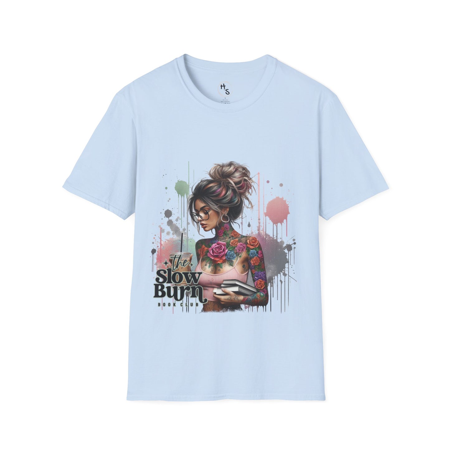 Light blue t-shirt with a graphic design of a woman with tattoos and text on a white background