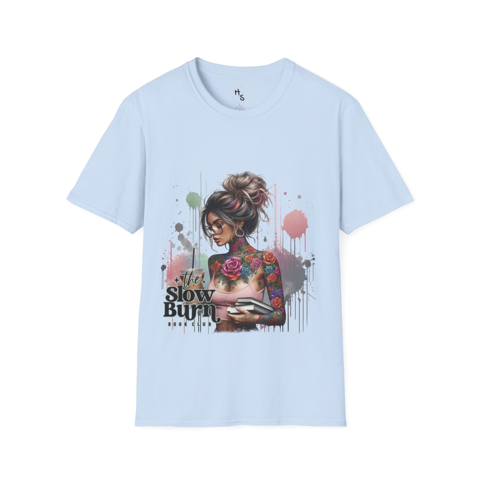 Light blue t-shirt with a graphic design of a woman with tattoos and text on a white background