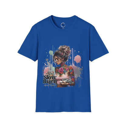Blue t-shirt with a graphic design of a woman holding a coffee and reading books on her way to bookclub