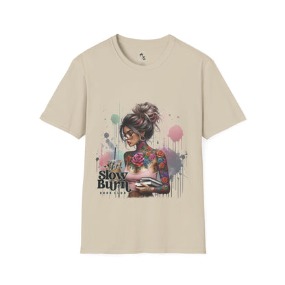 Beige t-shirt with a graphic design of a woman with tattoos and text on a white background