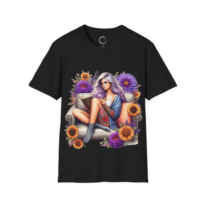 Black t-shirt with a colorful graphic of a woman sitting on a couch surrounded by flowers on a white background.