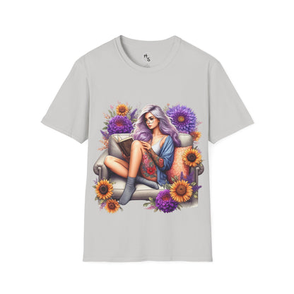 Gray t-shirt with a colorful graphic of a woman sitting on a chair surrounded by flowers on a white background.