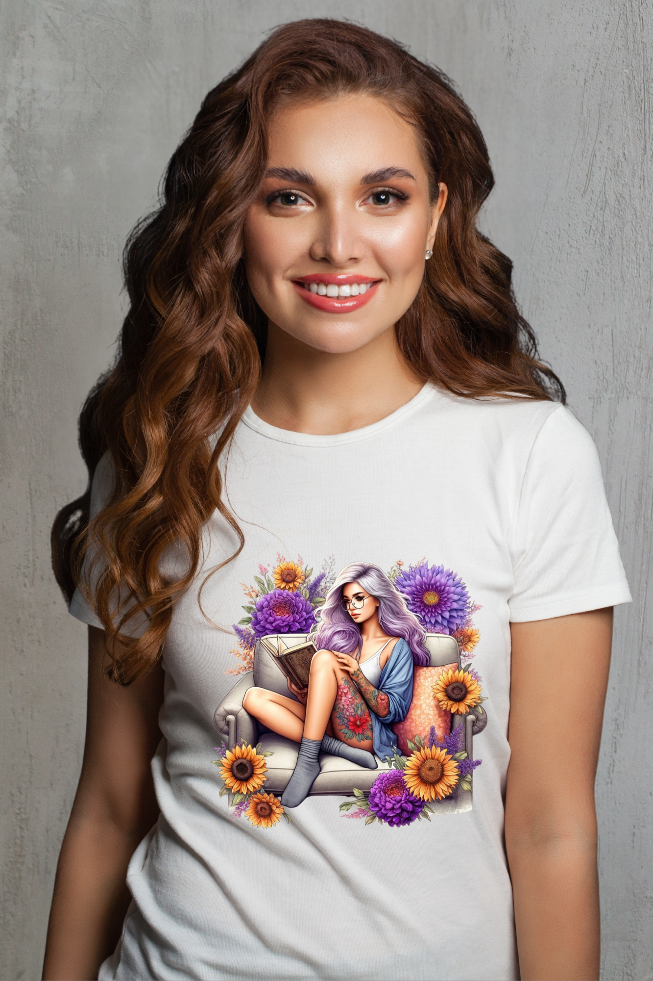 Woman wearing a white t-shirt with a colorful graphic design against a gray background