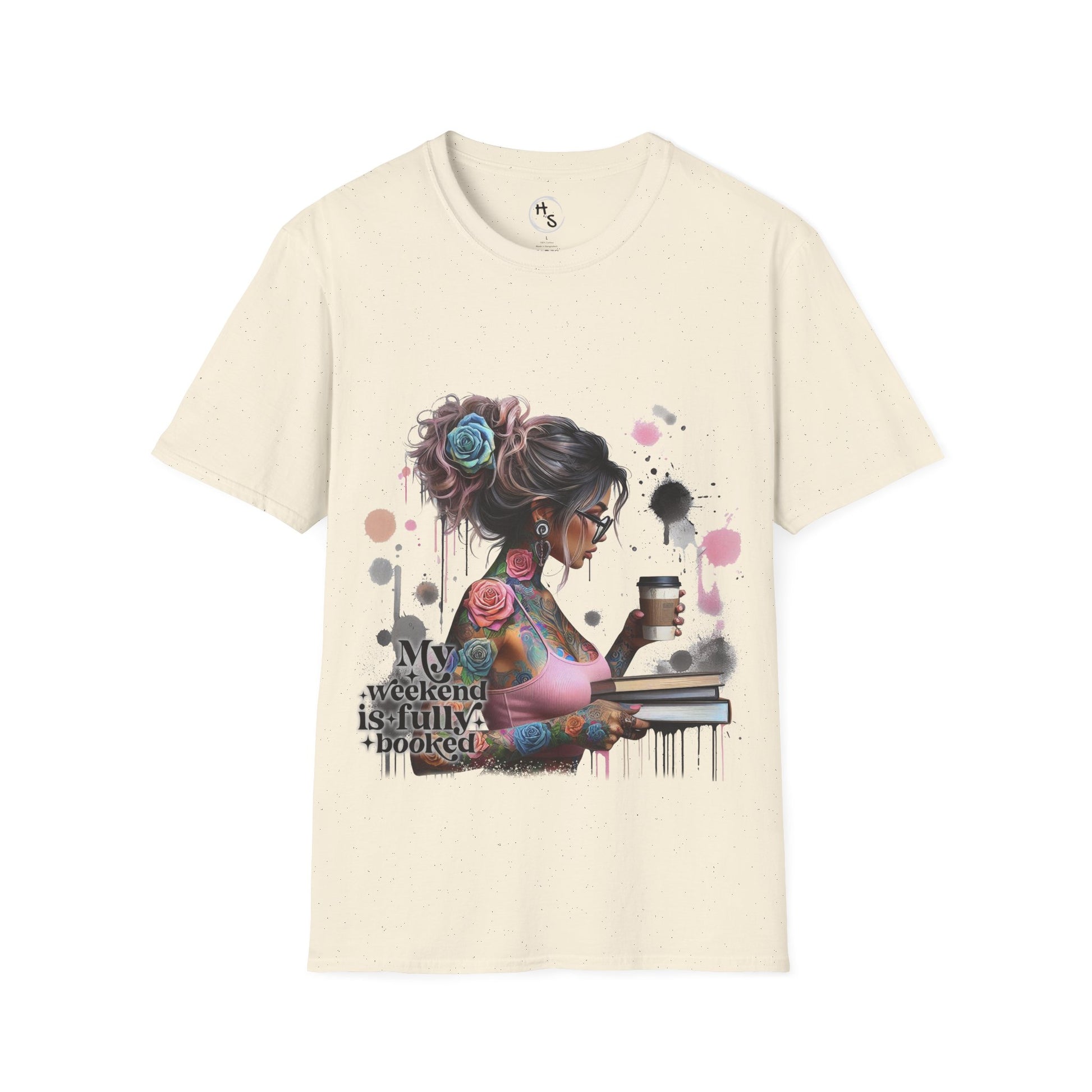 Beige t-shirt with a graphic design of a woman holding a coffee cup and a book, with text 'My weekend is fully booked'.