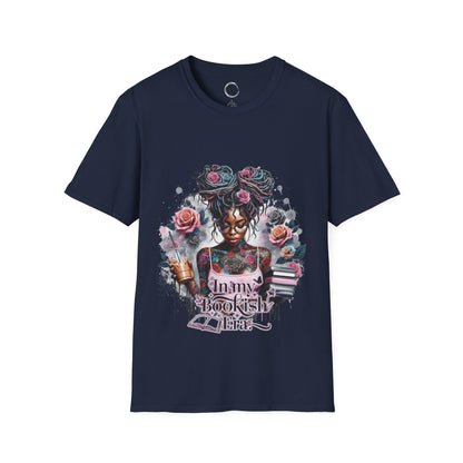 Navy blue t-shirt with a colorful graphic design featuring a woman with tattoos and flowers on a white background.