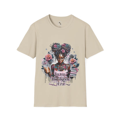 Beige t-shirt with a graphic design of a woman with tattoos and flowers on a white background