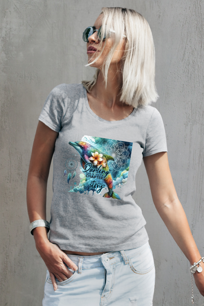 Grey shirt featuring a colorful bohemian dolphin with floral accents and dreamcatcher detail.