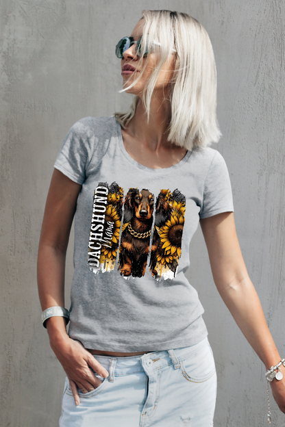 Person wearing a gray t-shirt with a dog graphic and text against a gray background