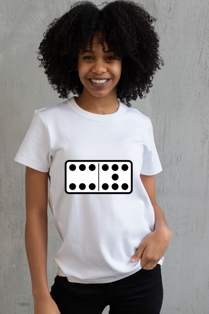 Person wearing a white 6 7 t-shirt with a black and white graphic design on a gray background