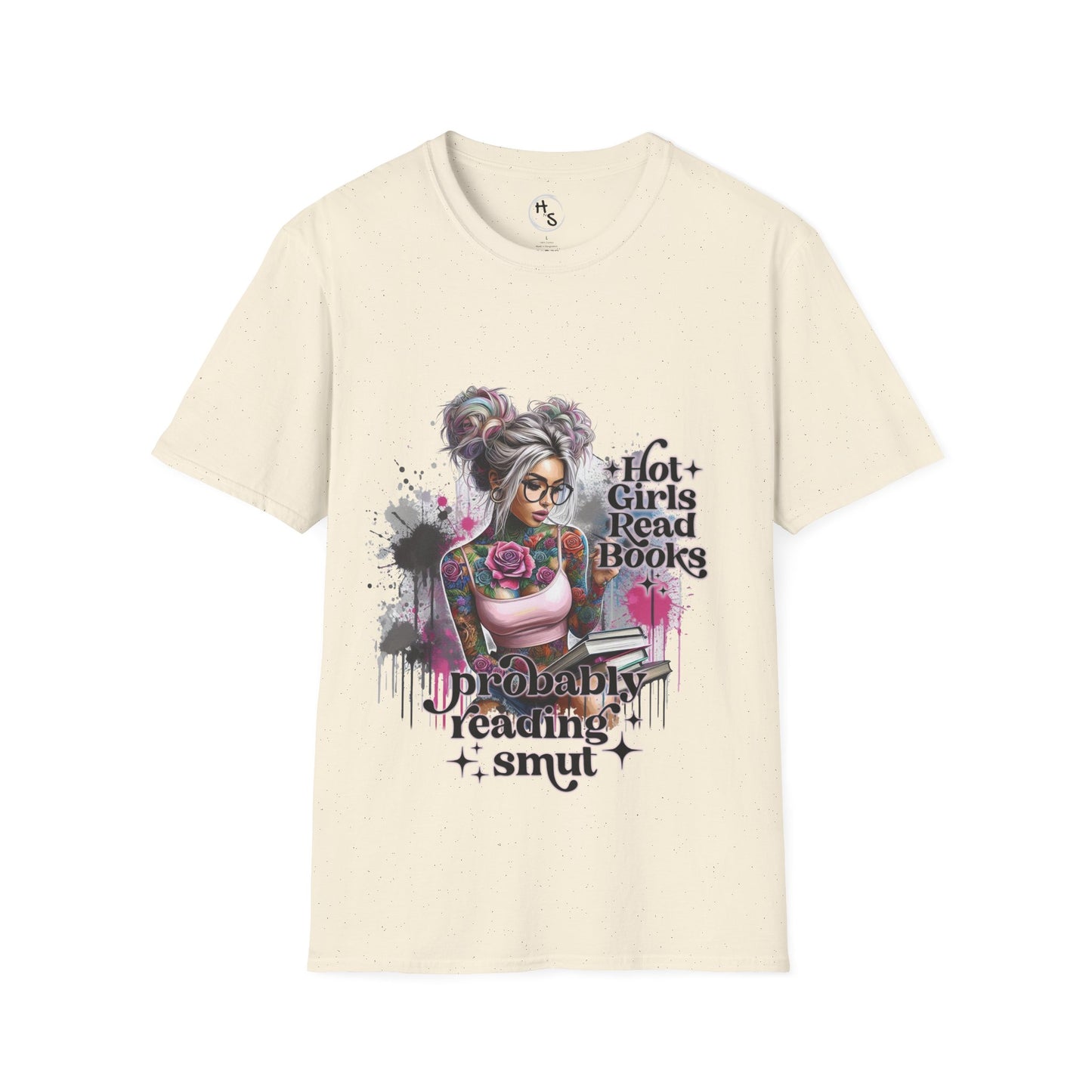 Beige T-shirt with a colorful graphic of a tattooed girl holding books, sitting casually against a gray wall.