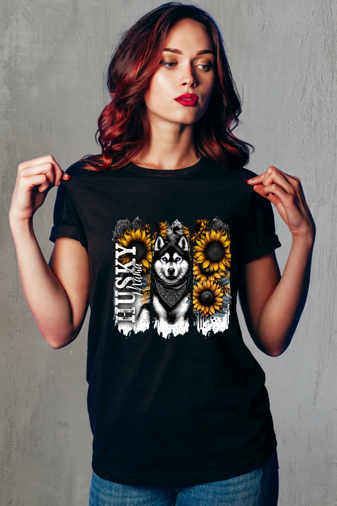 Woman wearing a black t-shirt with a husky and sunflower design against a gray background