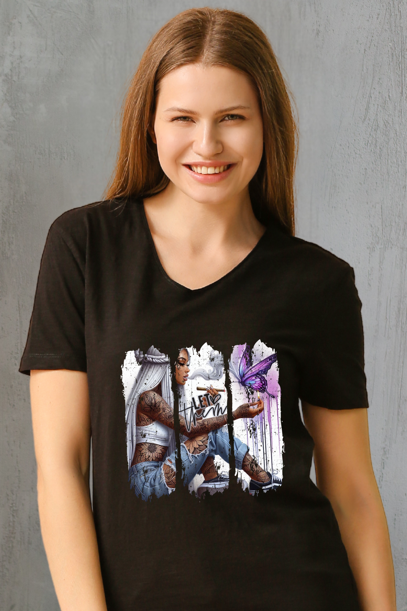 Woman wearing a black t-shirt with a graphic design on a gray background