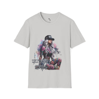 Gray t-shirt with a graphic of a woman with tattoos and flowers on a white background