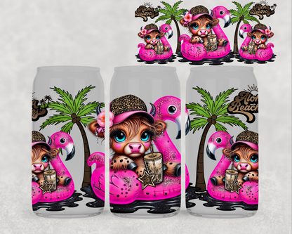 Three cans with a cartoon cow character wearing a pink flamingo floatie and hat, set against a white background.