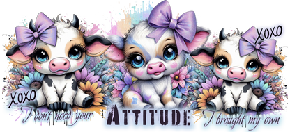 Three cartoon cows with bows and flowers, surrounded by text 'I don't need your attitude I brought my own' and floral elements.