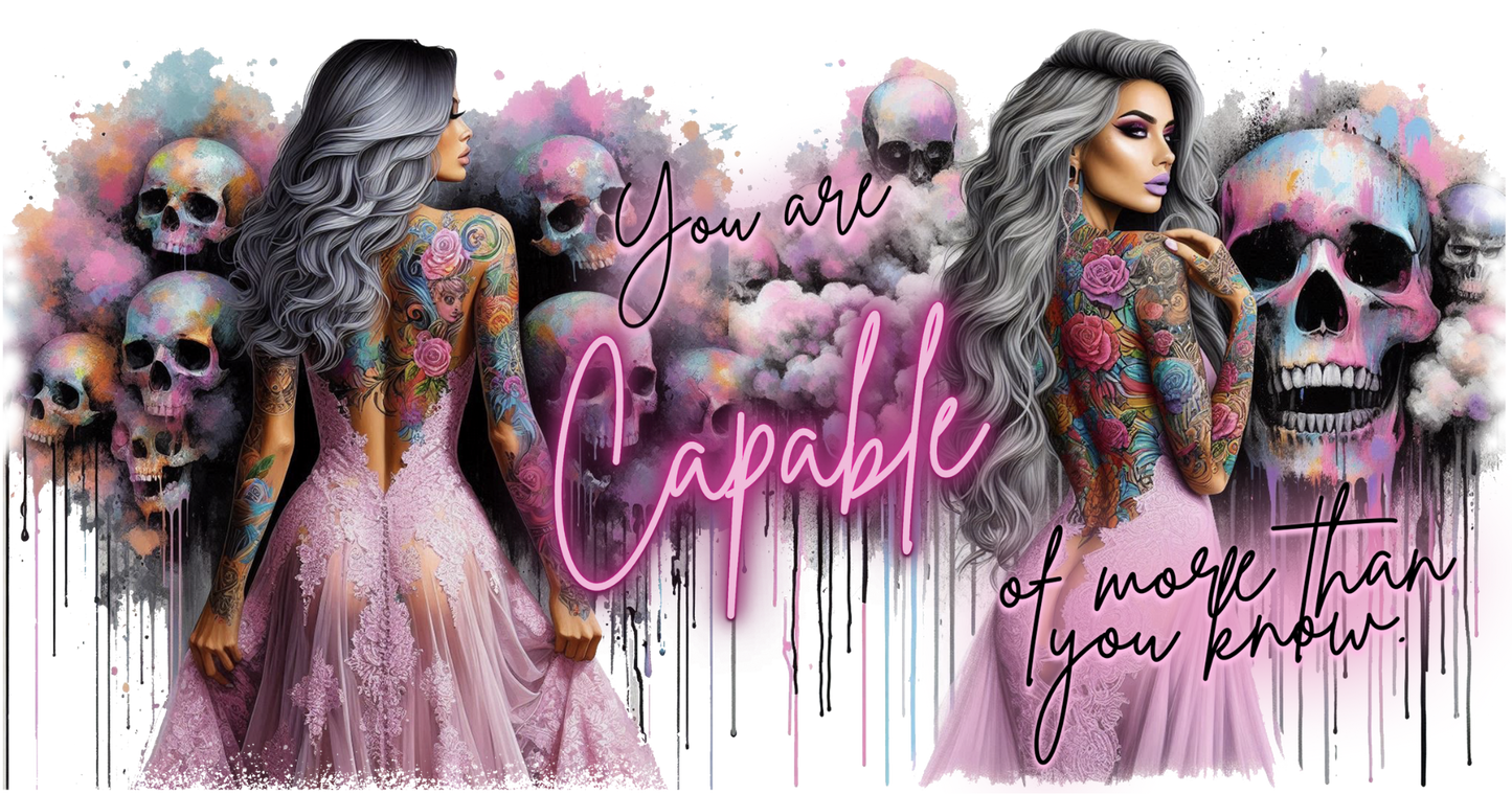 Motivational graphic with a woman, skulls, and text 'You are capable of more than you know' on a colorful background.