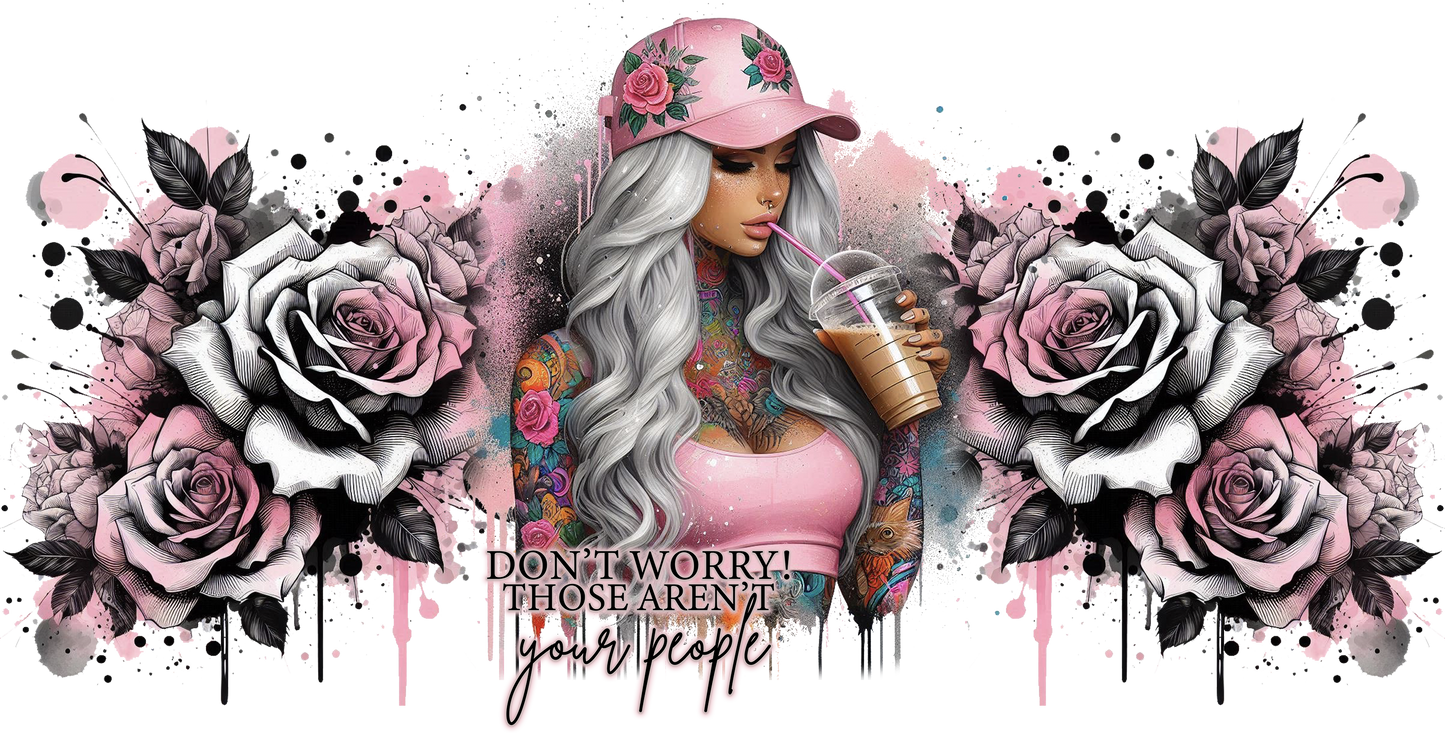 Woman with tattoos and flowers, holding a drink, surrounded by floral designs with text 'Don't worry! Those aren't your people'.