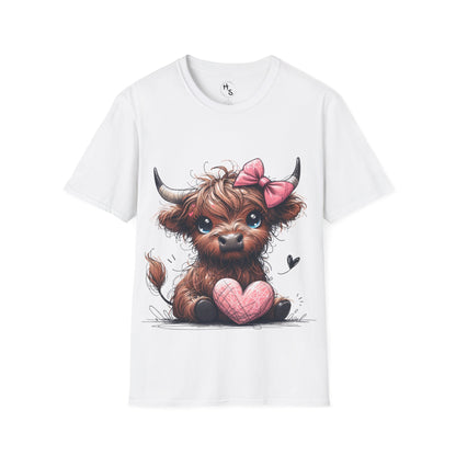 White t-shirt with a cartoon Highland cow holding a heart and wearing a pink bow on a white background.
