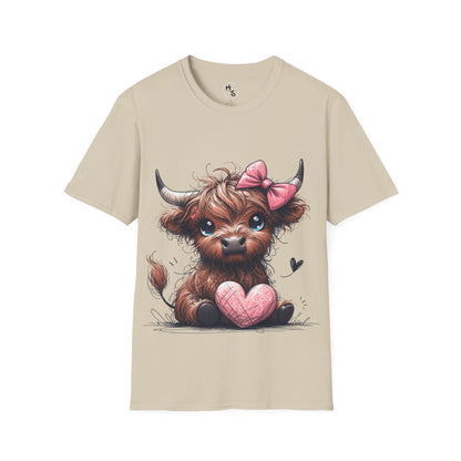 Beige t-shirt with a cartoon cow holding a pink heart on a white background