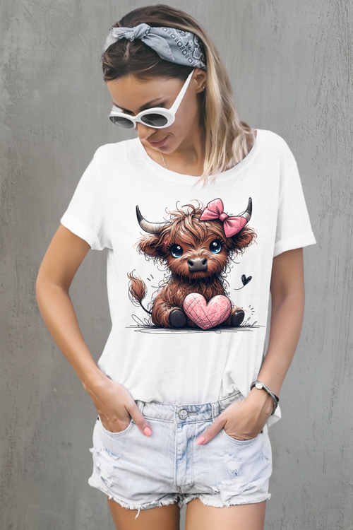 Woman wearing a white t-shirt with a cute animal design against a gray background