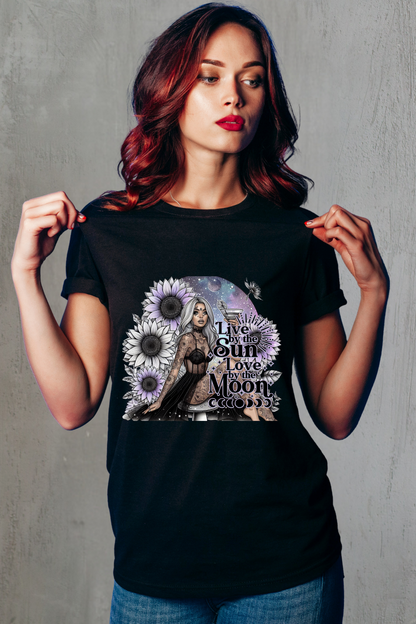 Woman wearing a black t-shirt with a graphic design on a gray background