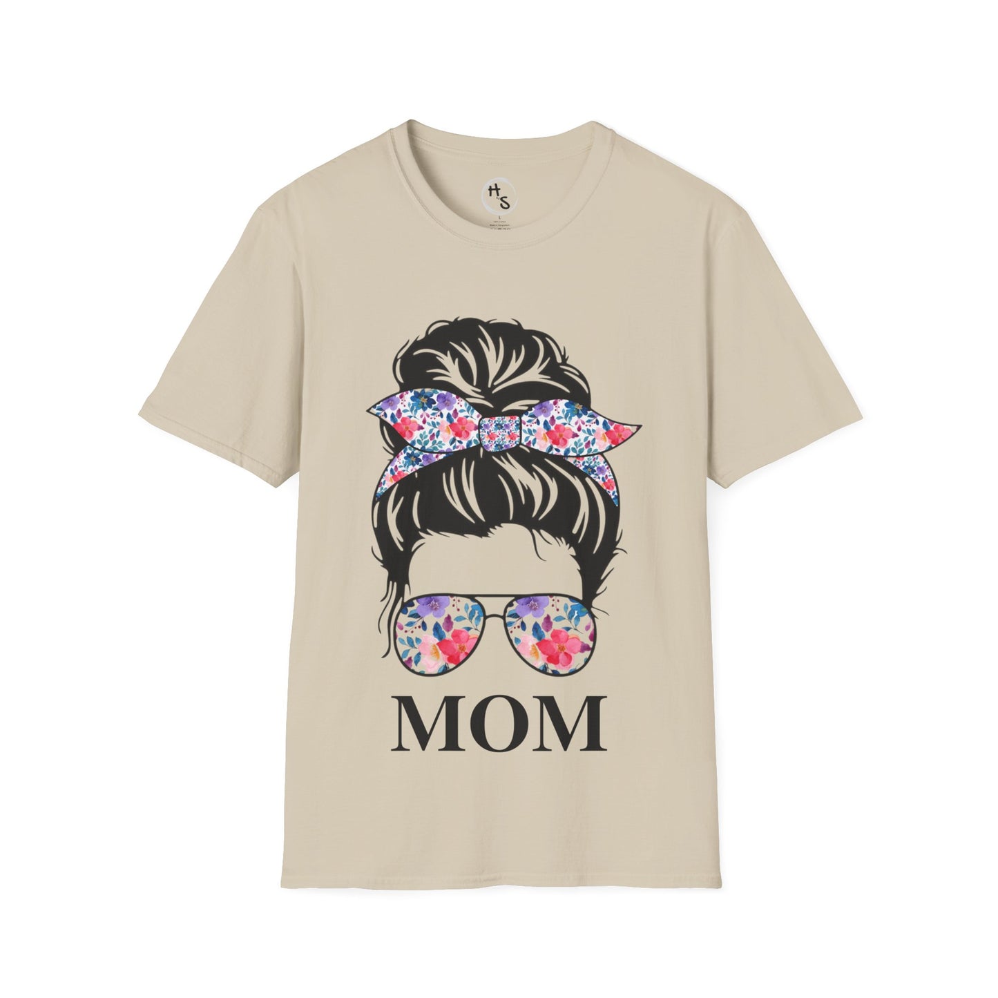 Beige t-shirt with graphic of a woman's head with a floral bow and sunglasses, and the word 'MOM'.