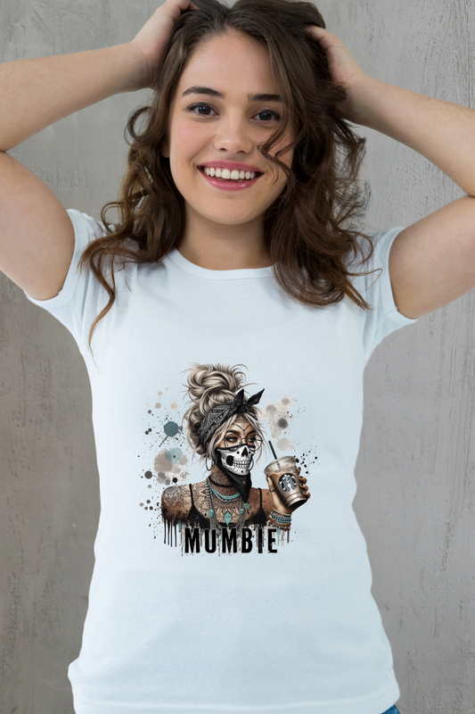Woman wearing a white t-shirt with a graphic design and the word 'MUMBIE'.