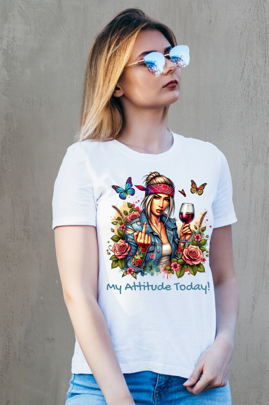 Woman wearing a white t-shirt with a colorful graphic and text, standing against a plain background.