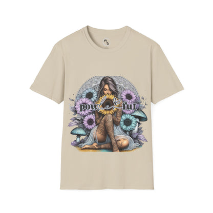 Beige t-shirt with a graphic design of a woman surrounded by flowers and mushrooms on a white background.