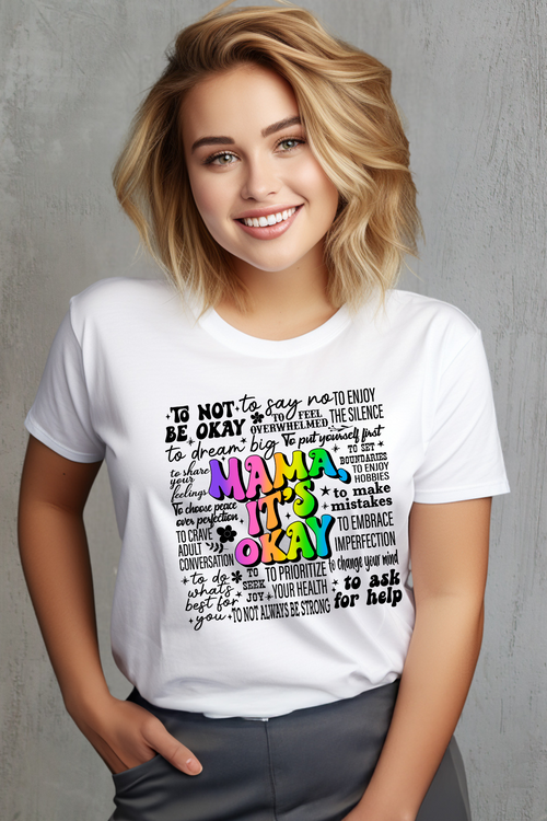 Person wearing a white t-shirt with colorful text design on a white background