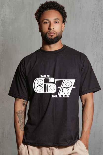 Man wearing a black 67 t-shirt with a white graphic design on a gray background