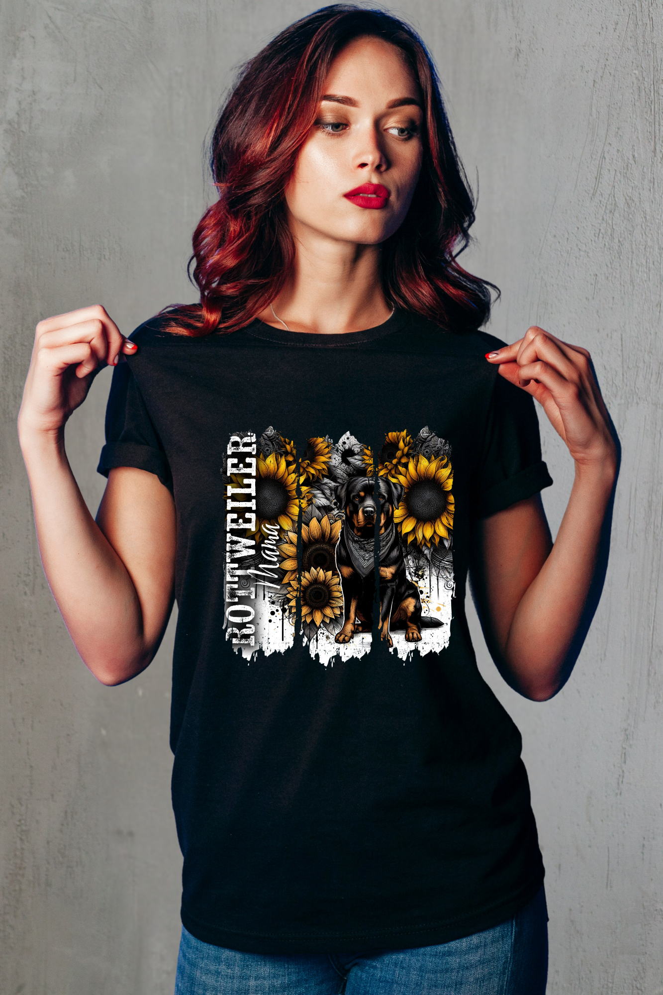 Woman wearing a black t-shirt with a Rottweiler and sunflower design on a black background