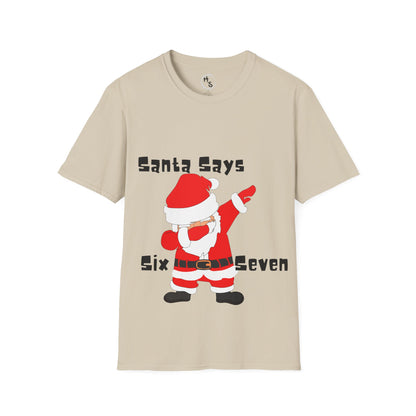 Beige t-shirt with a graphic of Santa Claus and text 'Santa Says Six Seven' on a sand background