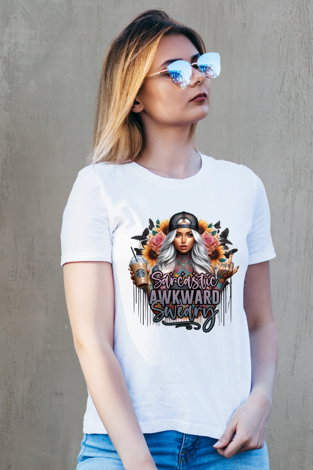 Woman wearing a white t-shirt with a graphic design and text against a gray background