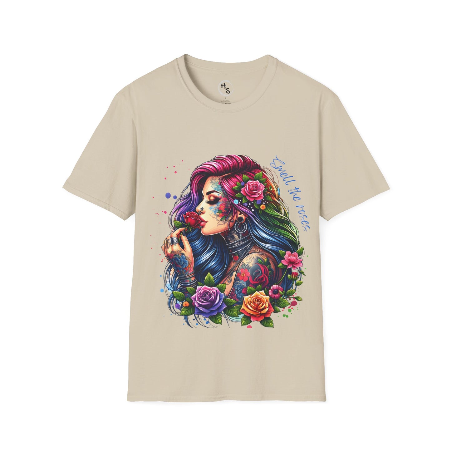 Beige t-shirt with a colorful graphic of a woman with flowers in her hair on a white background