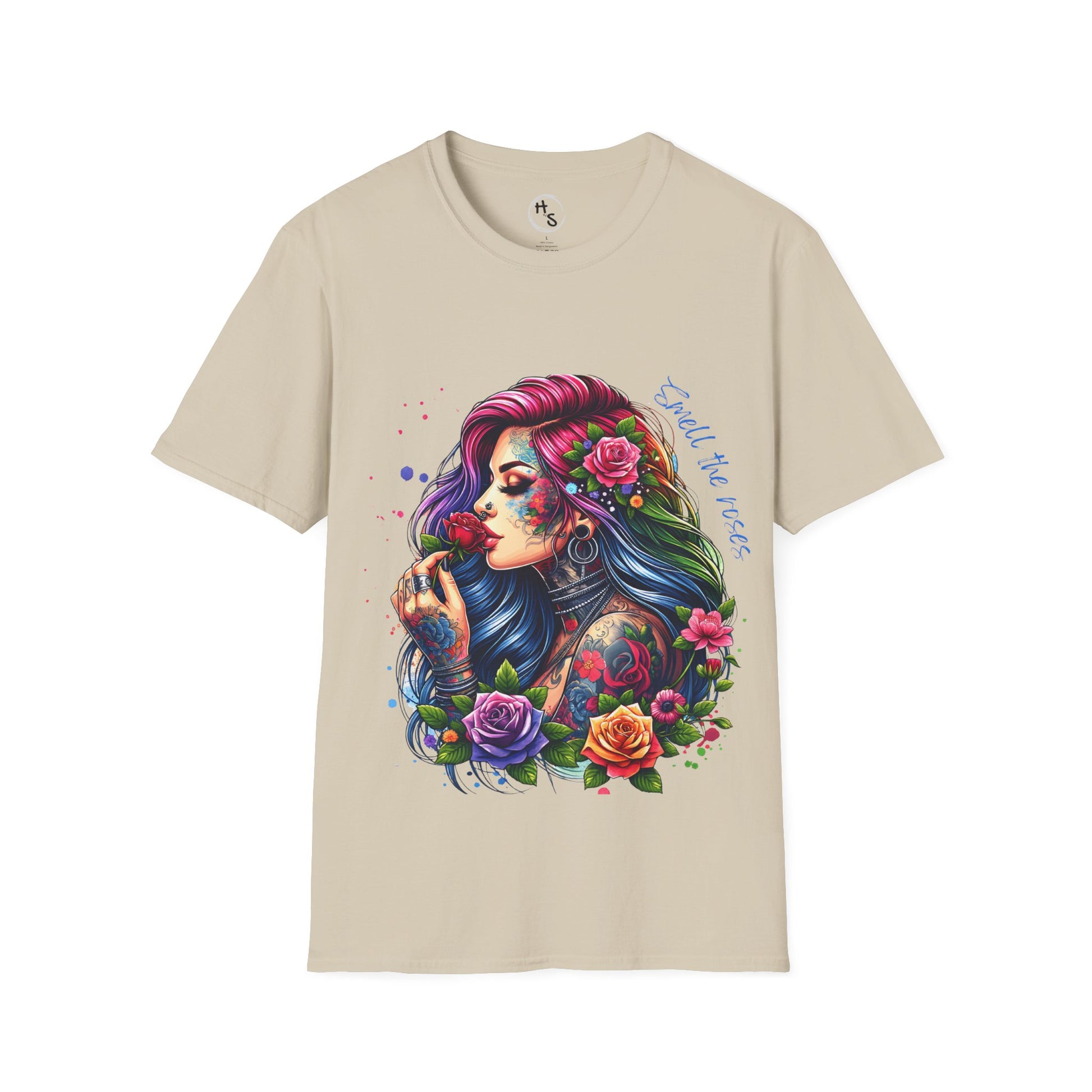 Beige t-shirt with a colorful graphic of a woman with flowers in her hair on a white background