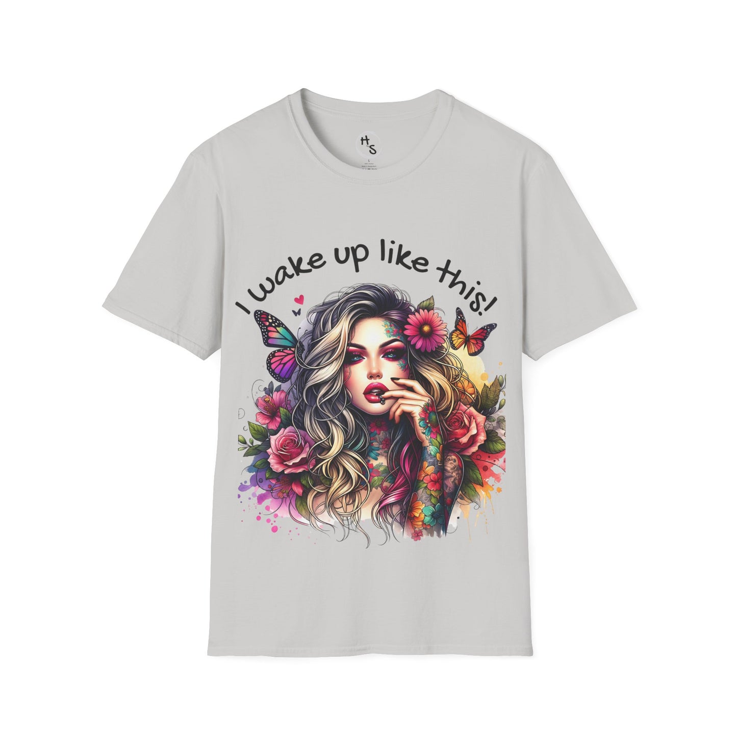 Gray t-shirt with a colorful design of a woman with flowers and butterflies, and text 'I wake up like this!'.